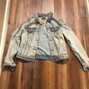 Distressed jean jacket